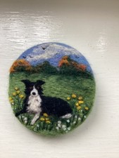 NEEDLE FELT BROOCH HAVING A REST IN FLOWER FIELD