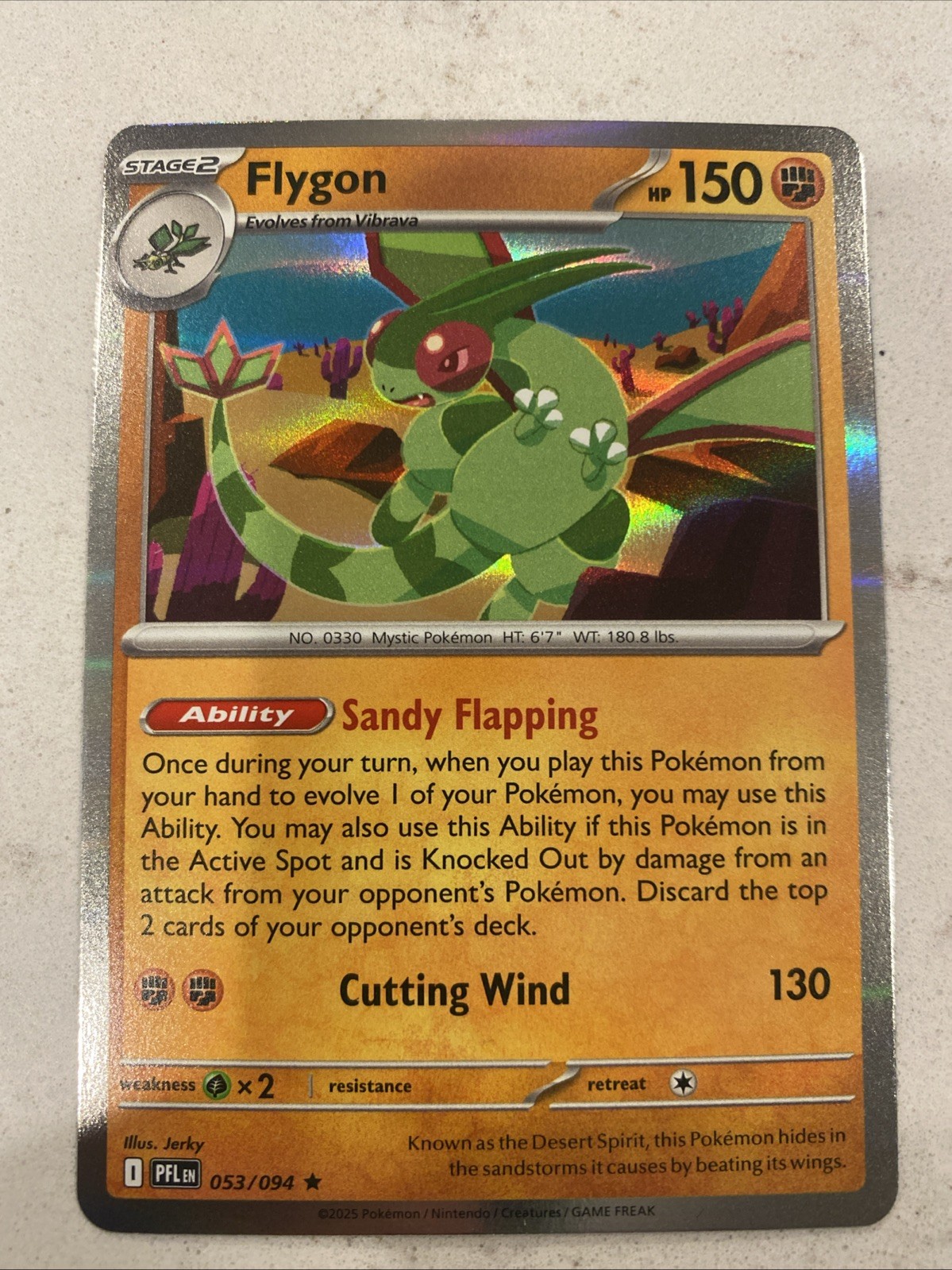 Flygon 053/094 Me02: Phantasmal Flames Holo