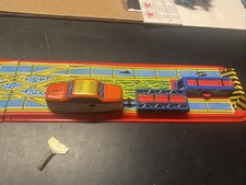 Vintage 1950  s  Tin Litho "Switch  Dump" WInd-up Train set Works
