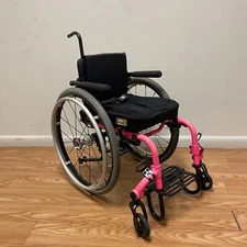 TILITE TWIST PEDIATRIC MANUAL WHEELCHAIR. 12" W X 14" D.