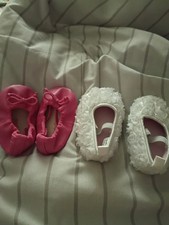 Two Pair Of Infant Shoes One Pink And One Pair White
