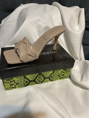 Cape Robbin 'Wave It' mules feature a woven strap design  a square toe. Size 10
