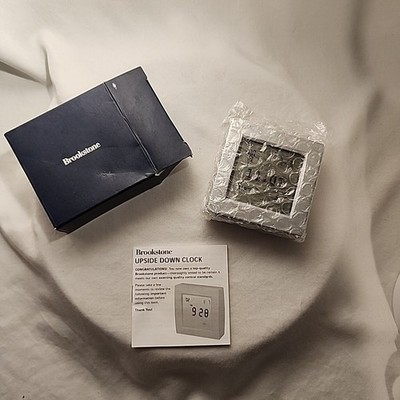  NEW- BROOKSTONE Upside Down Clock World Time/Timer/Temperature