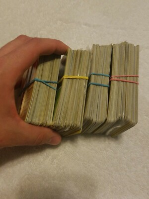 a stack of pokemon cards Pokemon Pok mon Assorted Cards, 50 Piece Mystery Pack : Amazon.ae: Toys main image 0