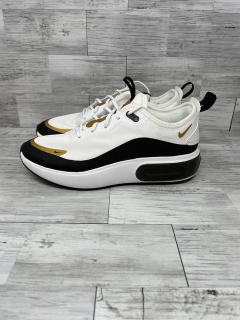 gold black and white air max