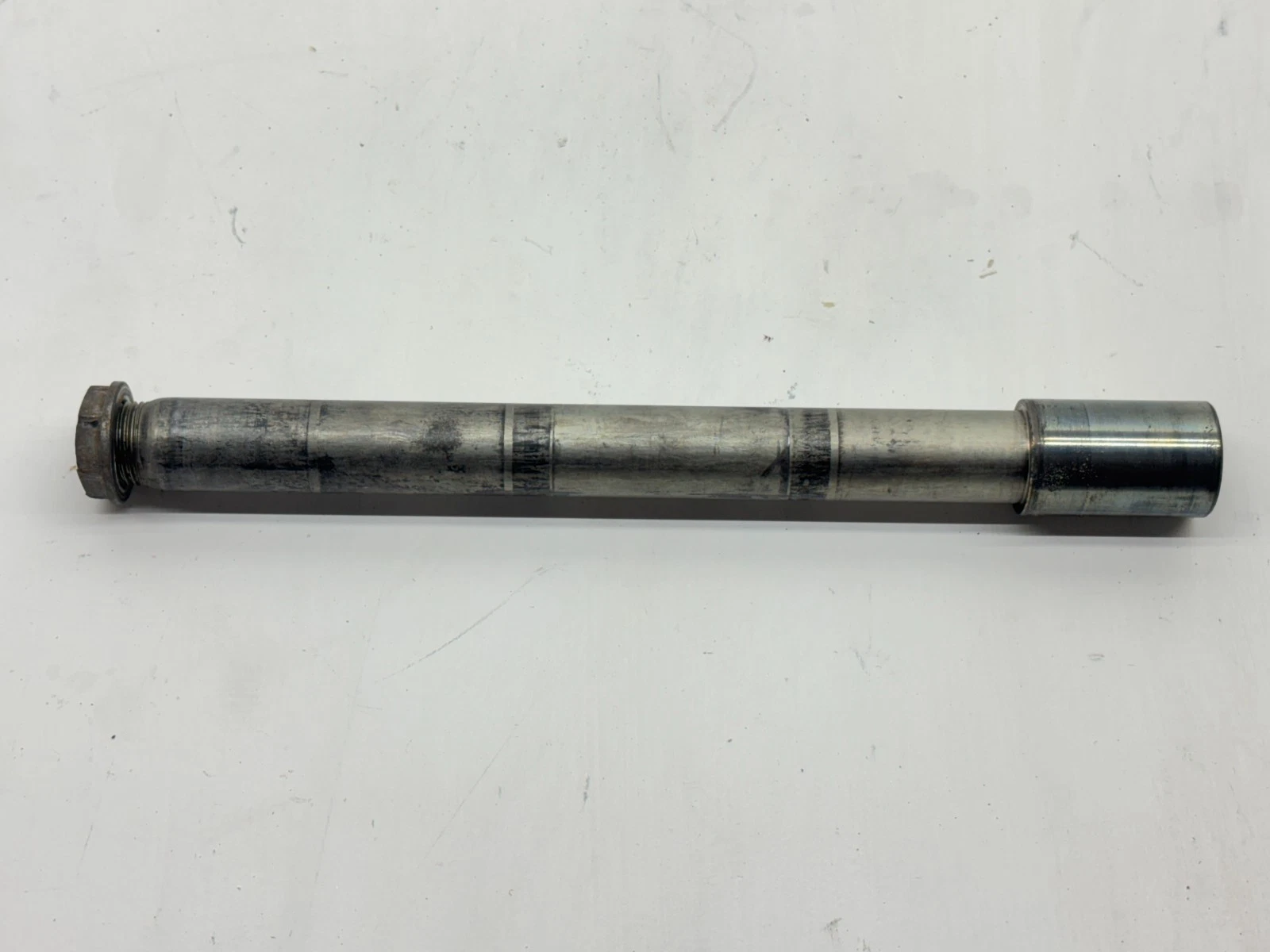 2002 Suzuki RM125 Front Wheel Axle w/ Nut Spindle Pivot Bolt OEM 54711-37F00