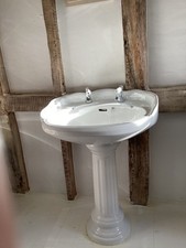 1Traditional White Ceramic Basin On Matching Pedestal Wi Th. Taps.