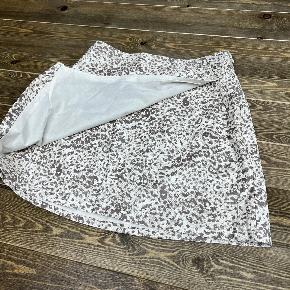 Minifalda vegana Free People talla 4 marrón con estampado de leopardo envolvente sintética Foto 2 de 4