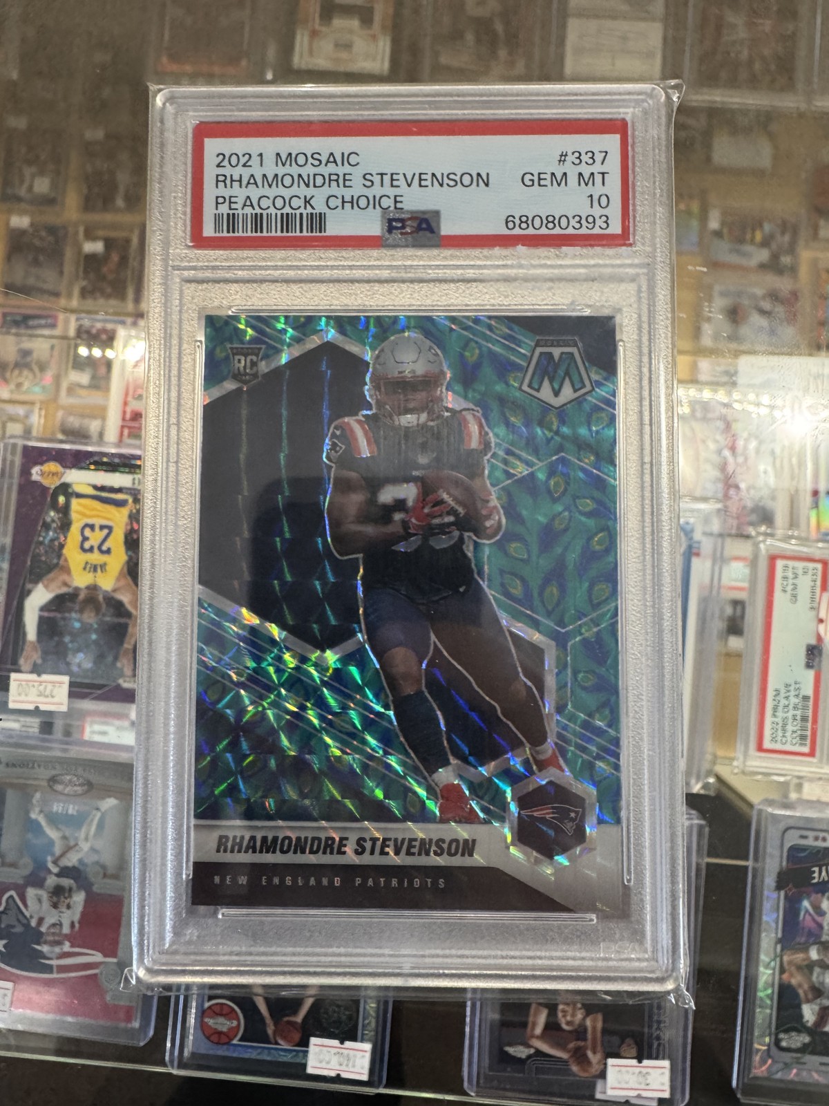 2021 Panini Mosaic - Rookies Rhamondre Stevenson #337 Peacock PSA 10