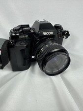 Ricoh XR-P 35mm SLR w/Rikenon 35-70mm zoom lens, Filters And Traveling Bag