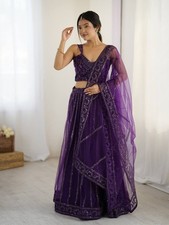 Attractive Look Purple Net Lehenga Choli With Dupatta For Indian Reception