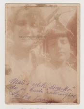 Capturing the Beauty of Two Lovely Young Women in a Close-Up Antique Snapshot