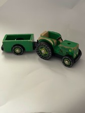 Used wood tractor with green cart, in good condition. Suitable for collectibles