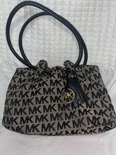 Michael Kors Logo Print Bucket Bag Beige Black Drawstring Tassel Charm