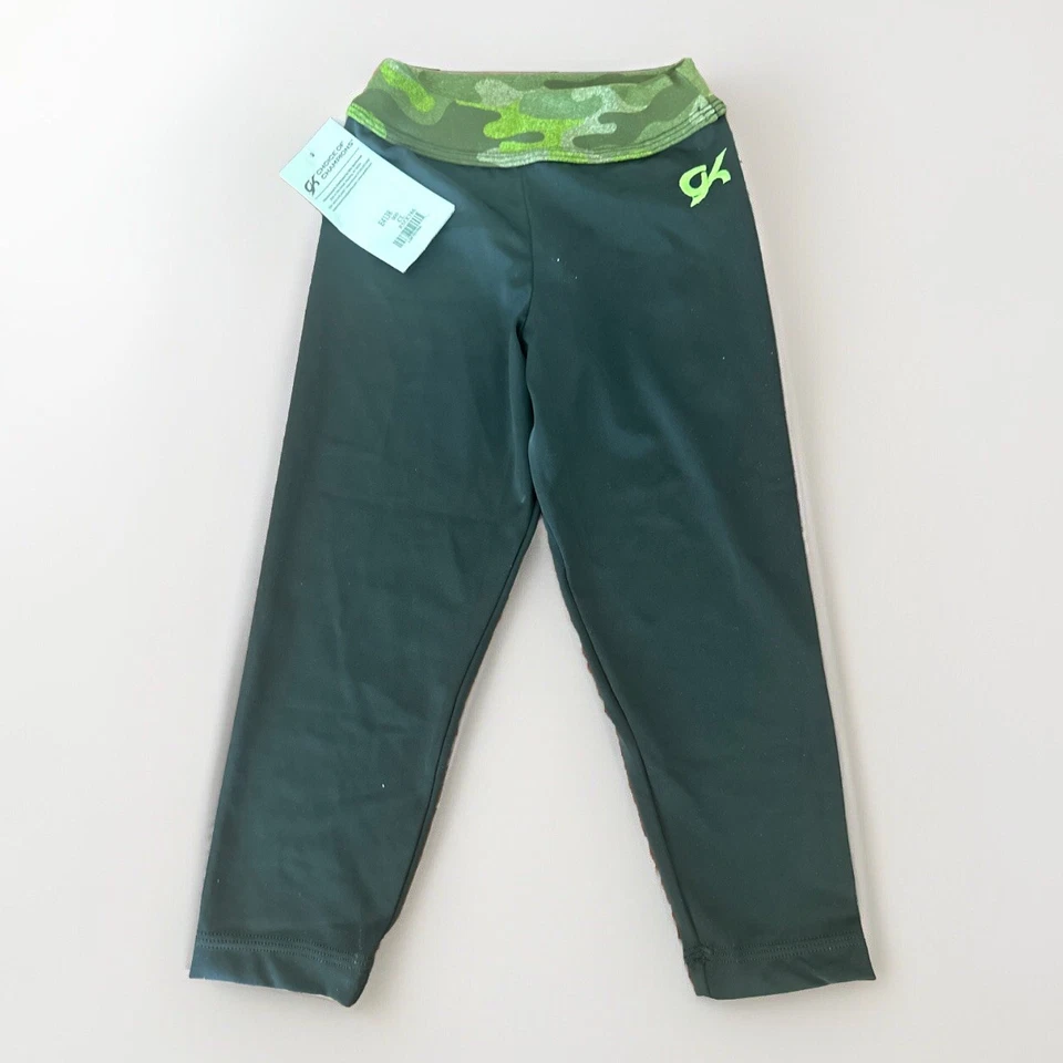 NUEVO CON ETIQUETAS LEGGINGS GK Elite Gimnasia PANTALONES NEGROS camuflaje Capri SPANDEX Niñas talla CL Foto 2 de 4