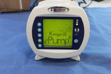 COVIDIEN KANGAROO ENTERAL FEEDING PUMP W/POLE CLAMP & POWER SUPPLY