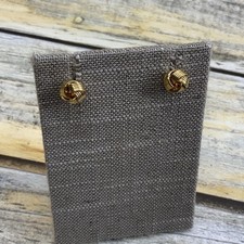 Simple pierced gold tone wire knot stud earrings