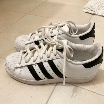 black adidas shell toe