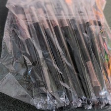 Black Disposable Makeup Brush Set with Black Handles in Plastic Packaging