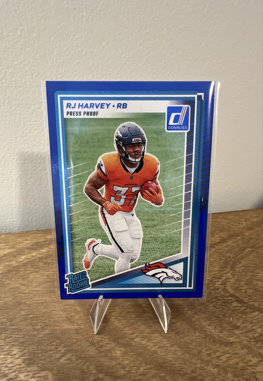 2025 Panini Donruss - Rated Rookie RJ Harvey #312 Press Proof Blue (RC)