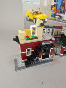 Retired and Complete Set: 3 in 1 LEGO CREATOR: Bike Shop & Cafe (31026)