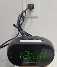 Amazon Basics Small Digital Oval Alarm Clock With LED Display Nightlight