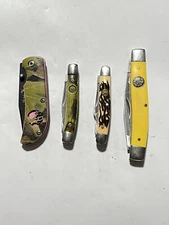 Lot of 4 Elk Ridge Pocket Knives .