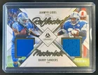 2024 Panini Luminance Jahmyr Gibbs Barry Sanders Reflected Jersey Gold #/50