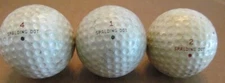3 USED DIMPLE GOLF BALLS-ALL ARE THE SPALDING DOT WITH CADWELL-GEER COVER