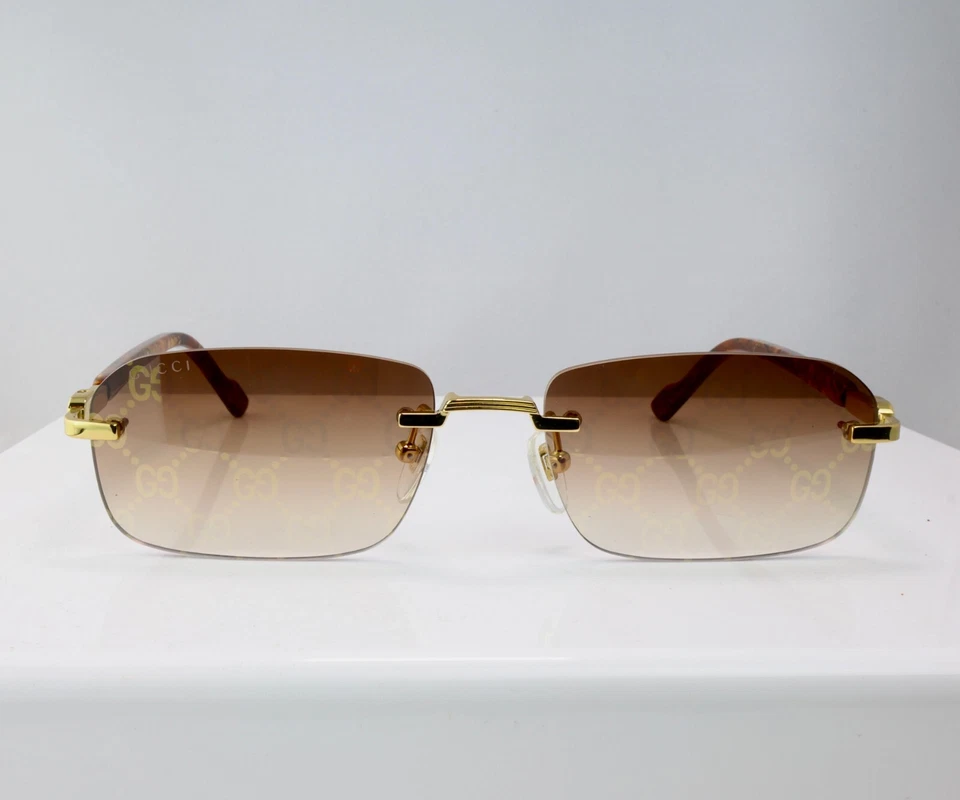 Gafas de sol Gucci GG1221S 004 56 mm cuadradas sin montura doradas con lente con logotipo marrón Foto 3 de 4