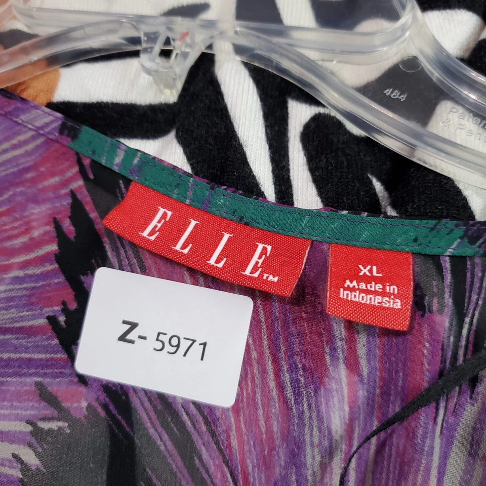 Blusa floral morada XL de Elle para mujer con lazo lateral transparente mangas acanaladas cuello redondo Foto 2 de 4