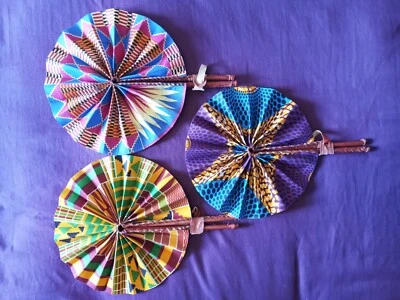 Beautiful Handmade African/Ankara print foldable hand fans /pure leather handle.
