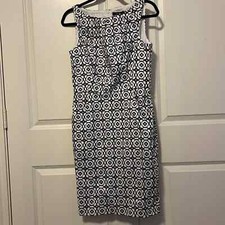Chaps sleeveless dress with front pockets and back hidden zipper. Size 8