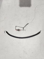 12" Striper Bass Lure Tube, with Rudder and Leader. Tube Color: Black.