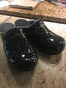 metallic silver clogs