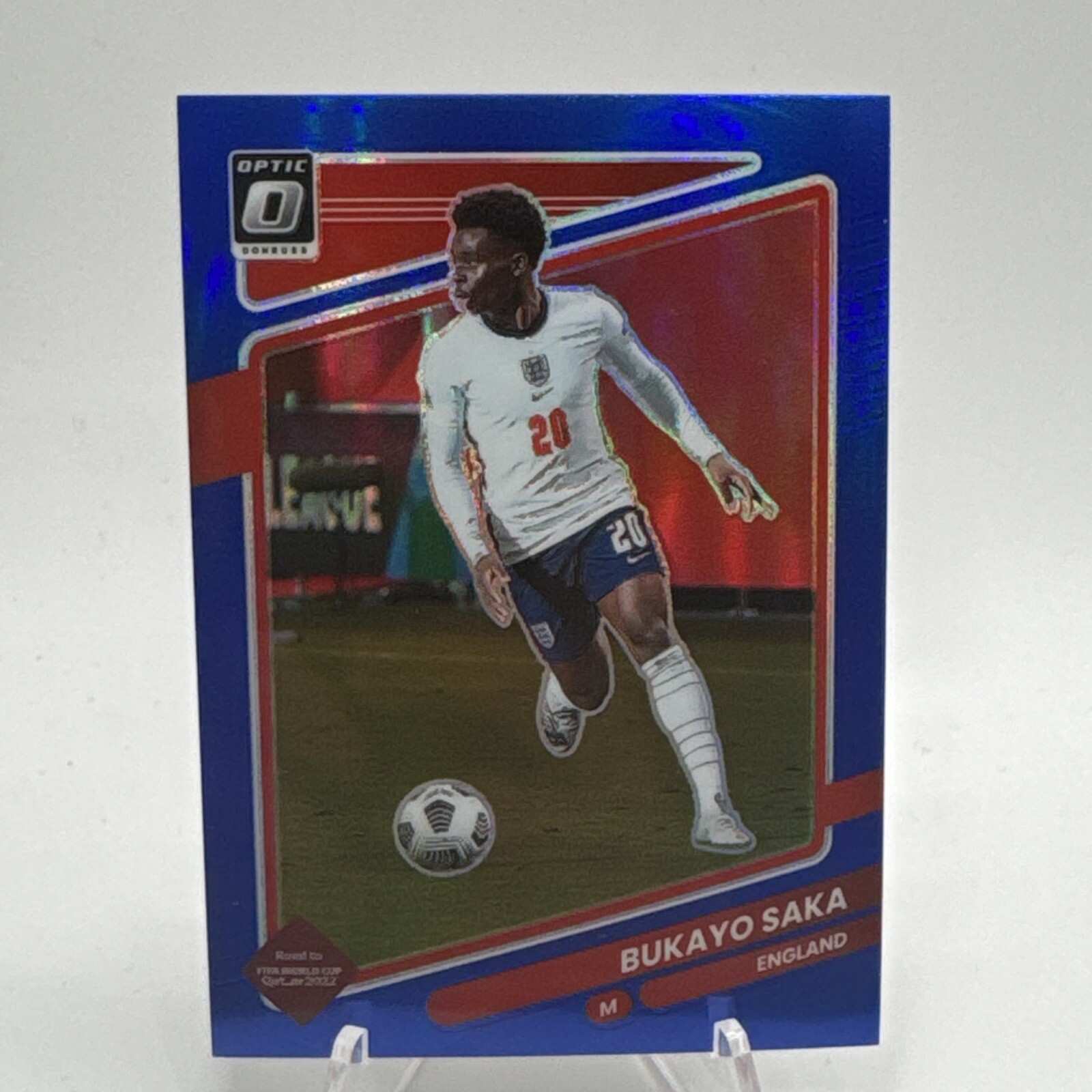 2021-22 Panini Donruss Road to Qatar - Optic Blue Prizm #54 Bukayo Saka /99