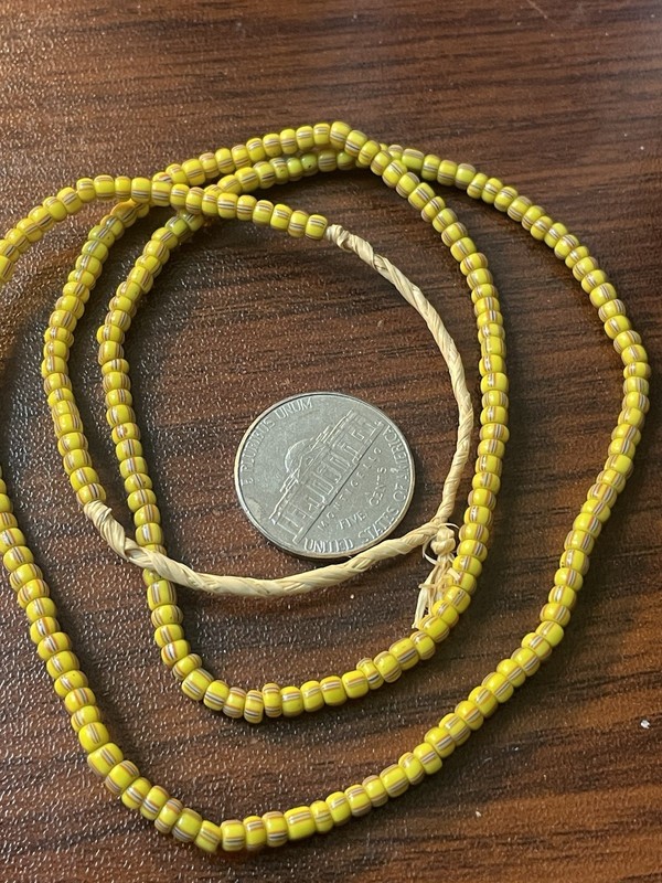 Antique African Yellow With Blue And Red Stripes Bead Strand