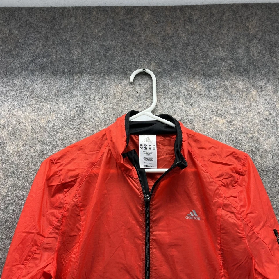 Chaqueta Adidas Mujer Pequeña Naranja Cremallera Completa Cortavientos Bolsillos Poliéster Pista Foto 2 de 4