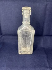 Rawleigh’s antique Medicine Bottle With Stopper.