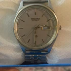 Seiko Quartz Analog Day/Date Central Second Silver Dial Steel Bracelet Watch