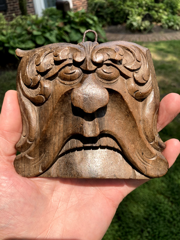 18th century carved walnut green man panel likely French. Baroque period