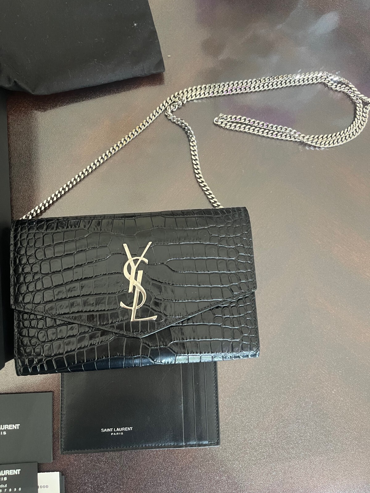 Portafoglio YSL Saint Laurent Uptown catena in pelle lucida goffrata coccodrillo