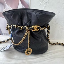 Auth Chanel Black Lambskin Small Bucket Bag Gold Chain CC Charm Drawstring