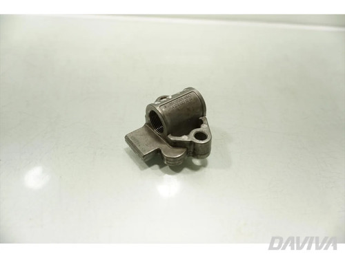 Timing belt chain tensioner