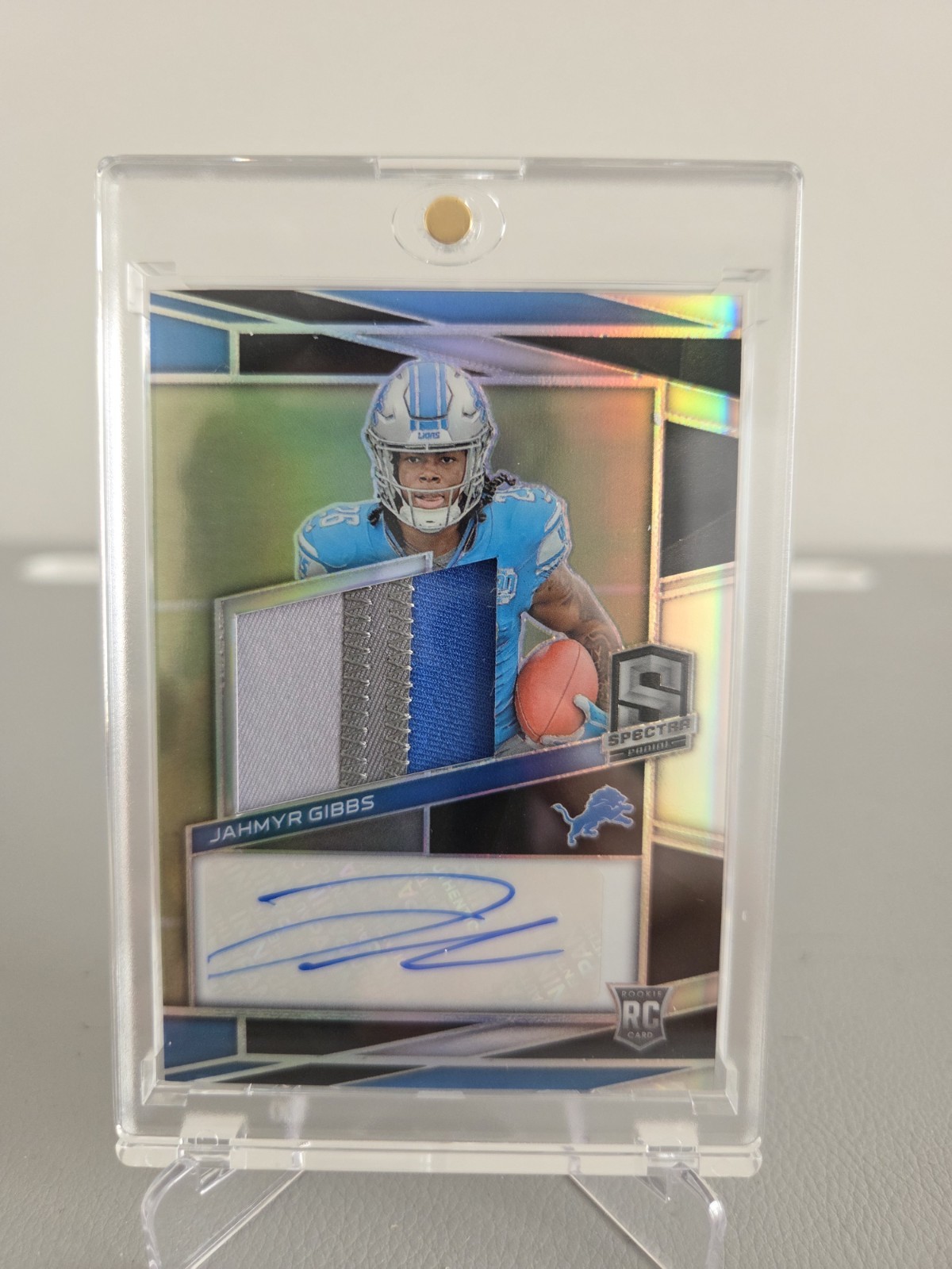 2023 Panini Spectra - Rookie Patch Autographs Jahmyr Gibbs #212 /99 3 Color