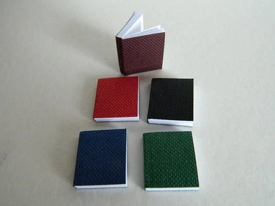 (M6.26) 1/12th scale DOLLS HOUSE SET OF FIVE OPENING BOOKS - Image 1 of 4