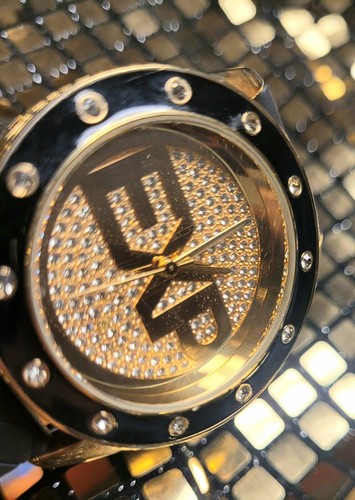 Reloj Express Tono Dorado con Correas de Silicona Negras Necesita Batería Precioso Reloj - Imagen 4 de 10