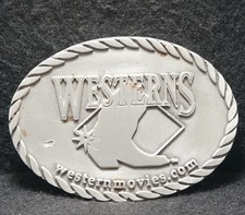 WK25148 VINTAGE 1970s WESTERNS WESTERN MOVIE COMPANY ADVERTISEMENT BELT BUCKLE