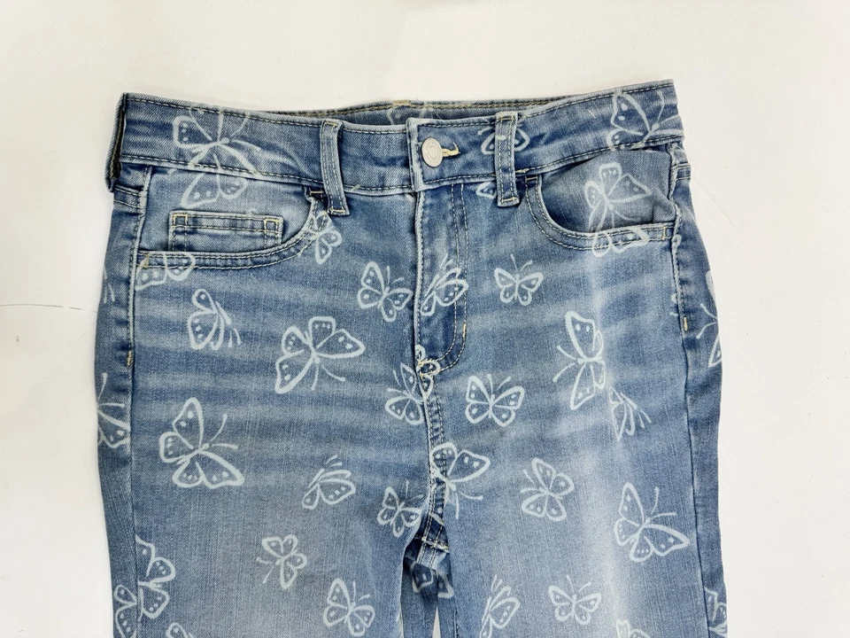 Pantalones de mezclilla Jumping Beans tiro alto acampanados para niñas lavado claro estampado de mariposas talla 10 nuevos sin etiquetas Foto 3 de 4