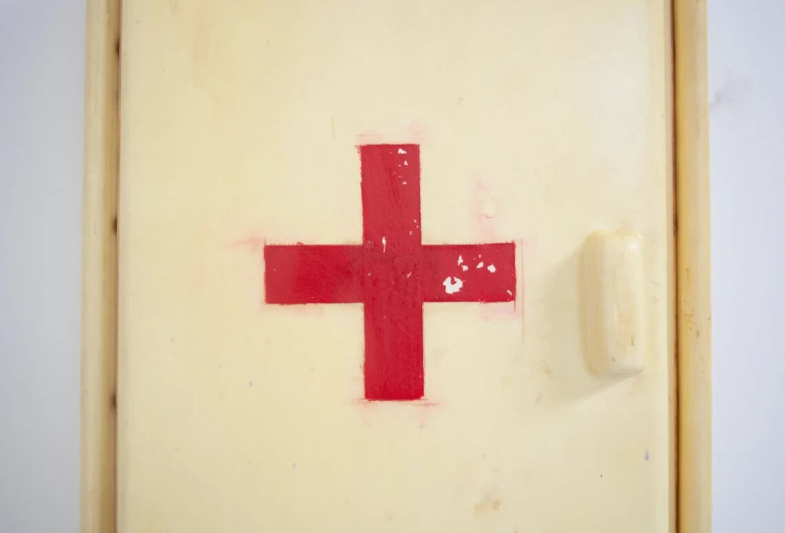 Vintage plastic medicine Bathroom wall Red cross